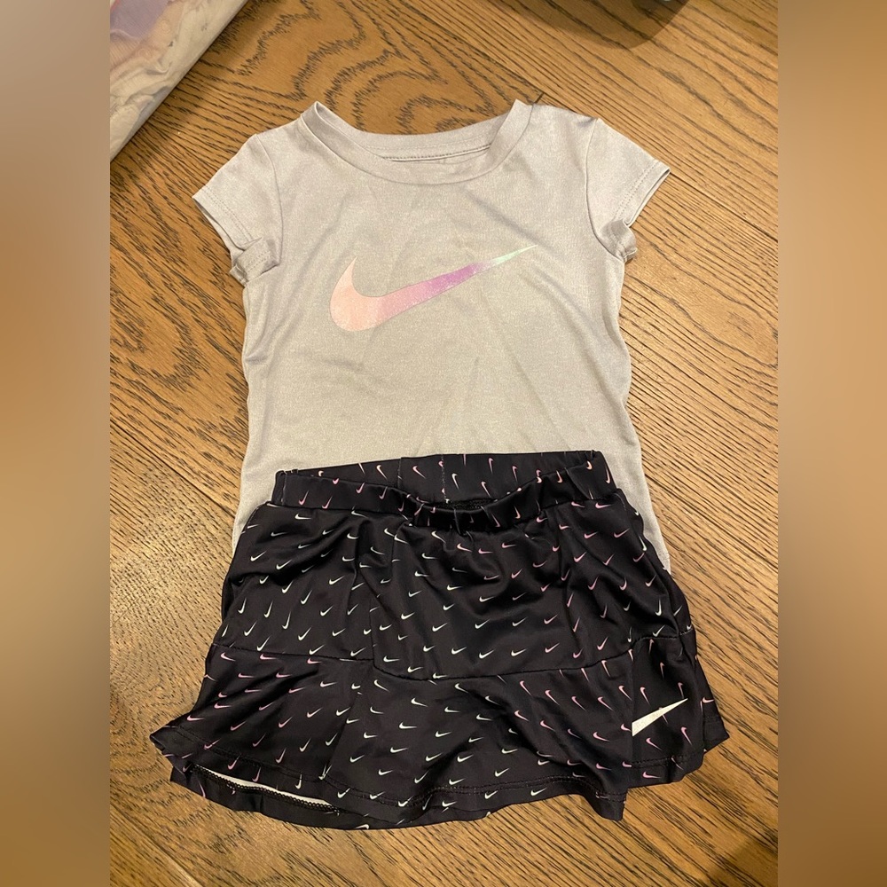 Nike 2 piece outfit. T-shirt and skirt with shorts. 2T.
